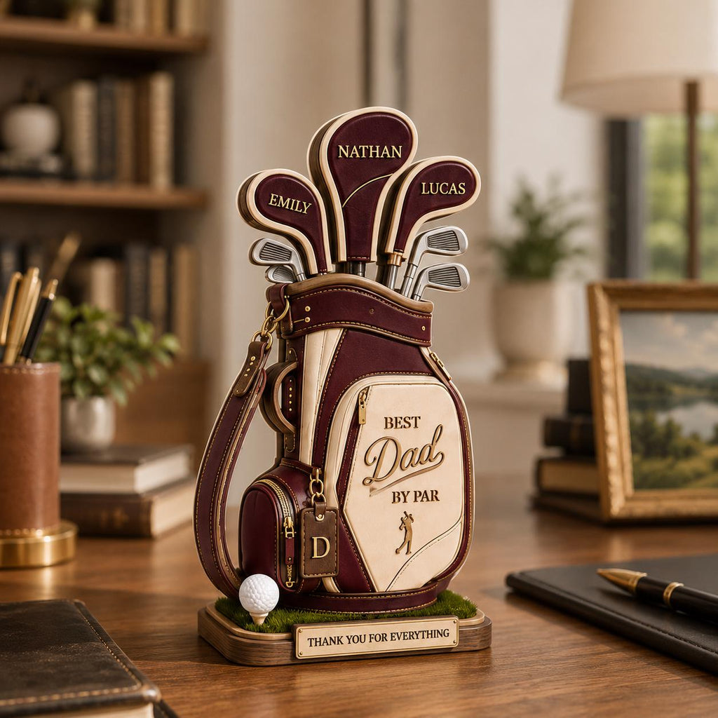 May include: A decorative golf bag figurine in burgundy, cream, and brown, with golf clubs bearing the names "Nathan," "Emily," and "Lucas." The bag reads "Best Dad by Par" and includes a golf ball and a base that says "Thank You For Everything."