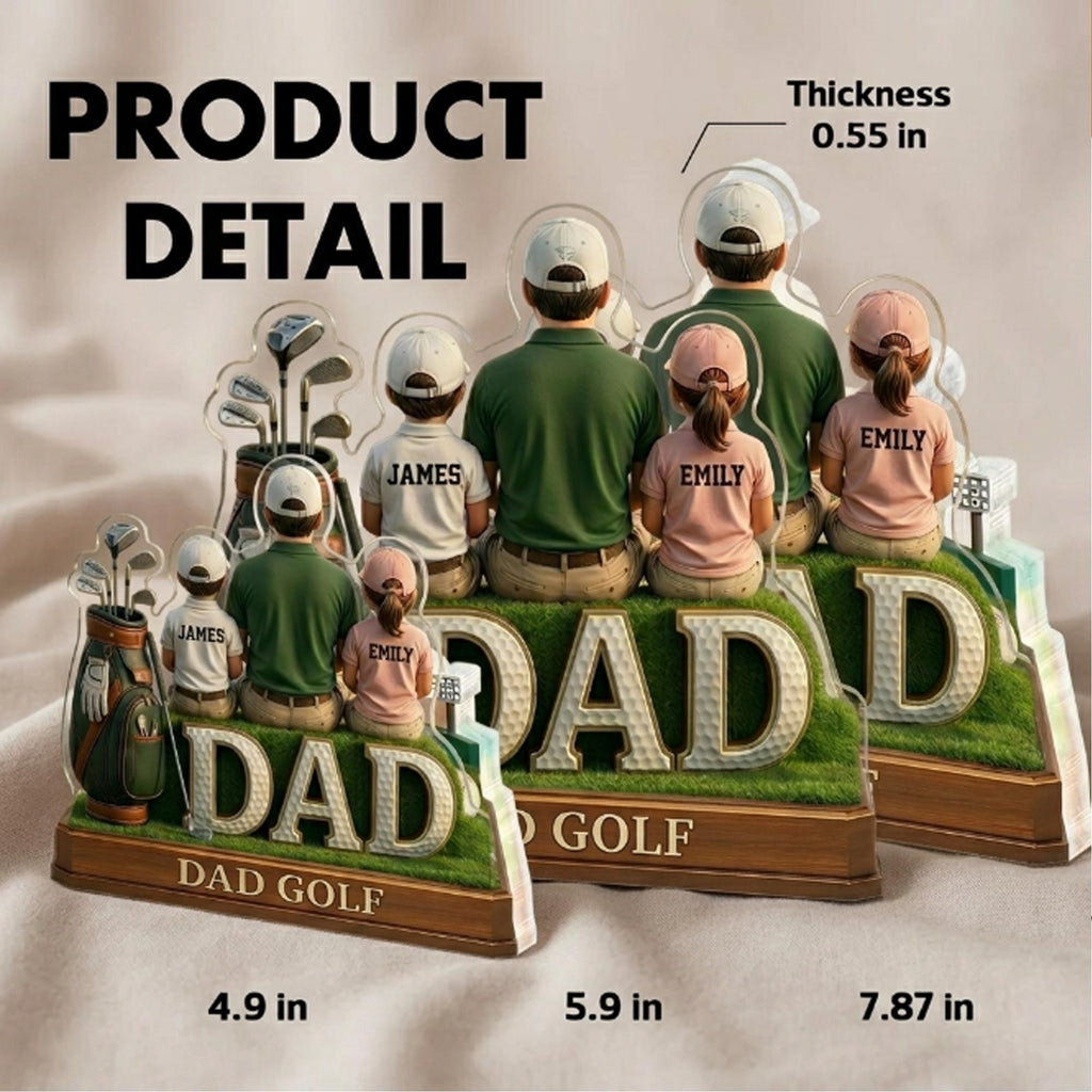 May include: Acrylic golf-themed family figurine with the word "DAD" in large letters. The figurine features a father figure with two children, each wearing a hat and shirt with names. The base reads "DAD GOLF" and the thickness is 0.55 inches.