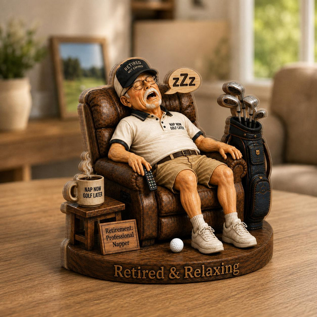 May include: A figurine of a sleeping retiree in a brown leather recliner wearing a beige polo shirt, khaki shorts, and a cap that says RETIRED NOT EXPIRED. A golf bag, a mug labeled NAP NOW GOLF LATER, and a sign reading Retirement: Professional Napper.