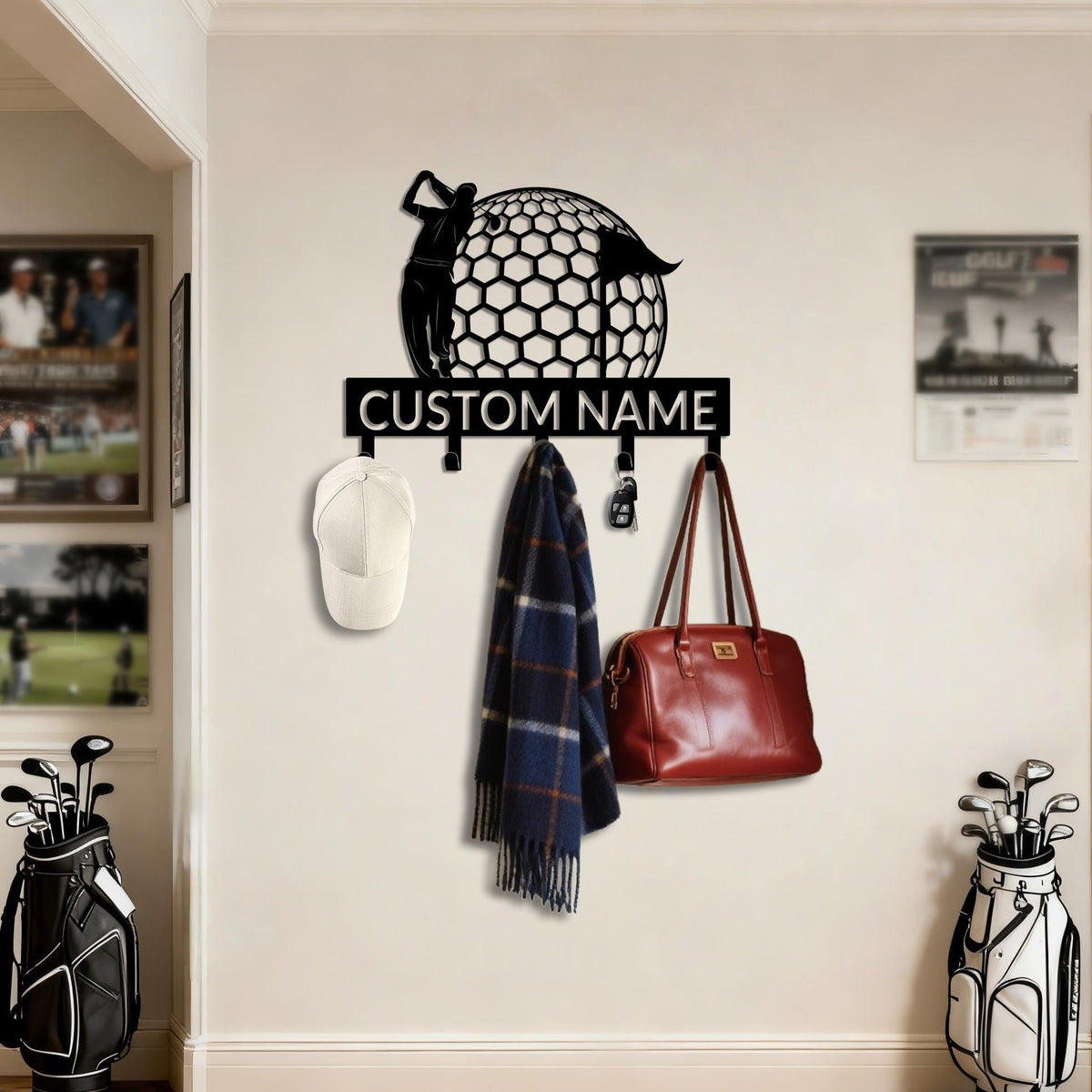 May include: Black metal golf-themed wall hook with the text "CUSTOM NAME". The design features a golfer silhouette and a golf ball. A white cap, a blue plaid scarf, keys, and a red handbag hang from the hooks.