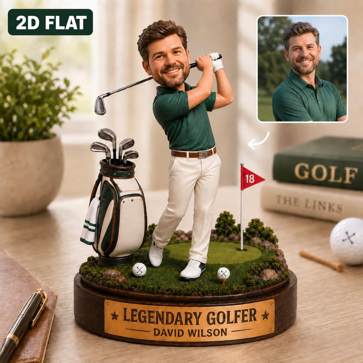 May include: A custom bobblehead figurine of a golfer wearing a green polo shirt and white trousers, swinging a golf club. The base features a golf bag, a green with a red flag marked 18, and a gold plaque reading LEGENDARY GOLFER DAVID WILSON.