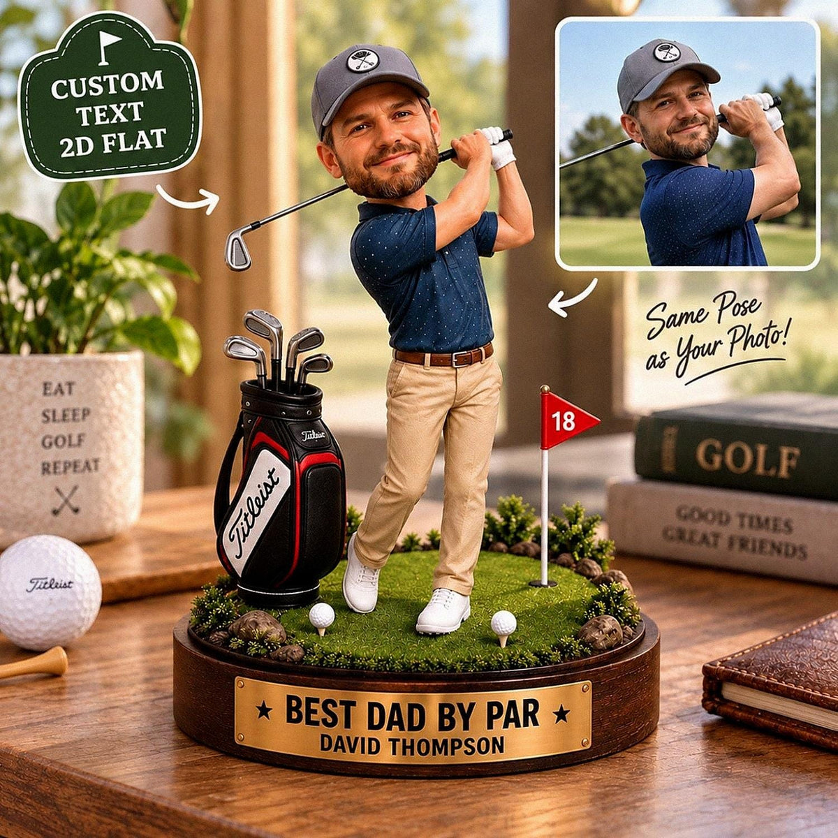 May include: A custom bobblehead figurine of a golfer wearing a grey cap, navy blue polo shirt, and khaki pants, standing on a green base with a golf bag, clubs, and a red flag marked 18. A brass plaque reads BEST DAD BY PAR DAVID THOMPSON.