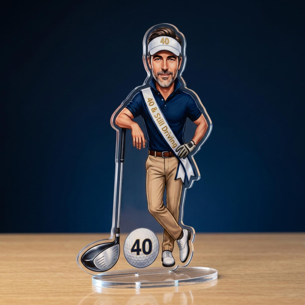 Close-up of illustration detail — polo shirt, visor with "40," sash text "40 & Still Driving," driver, golf ball — shows illustration quality and personalised elements