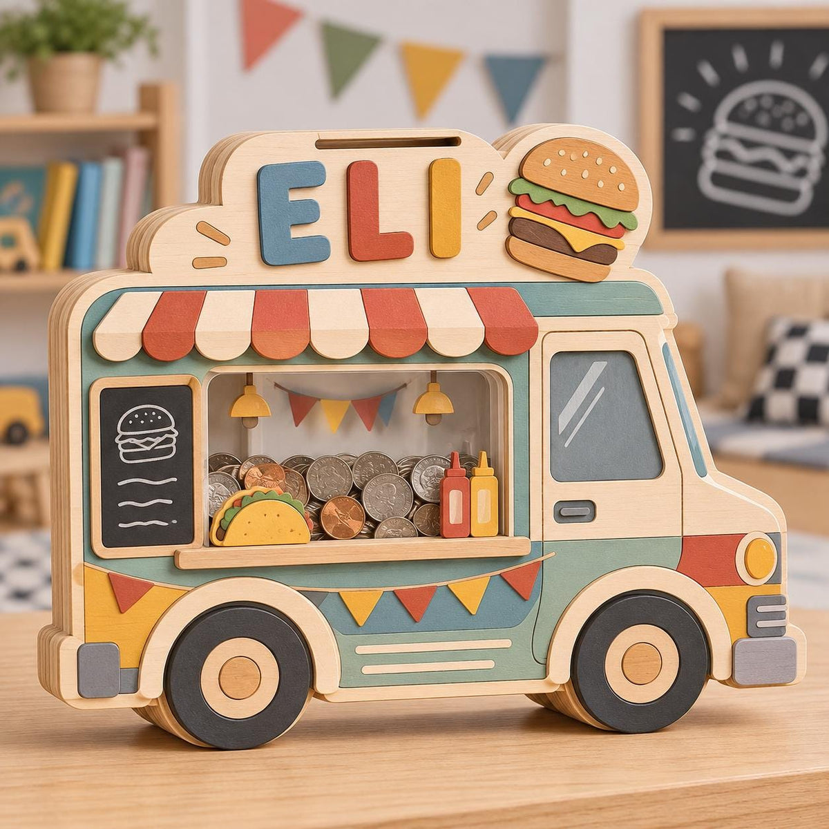 May include: A wooden food truck piggy bank featuring the name ELI in blue, orange, and yellow letters. The truck has a clear window filled with coins, a burger graphic, a taco cutout, and a striped awning. It is painted in muted tones.