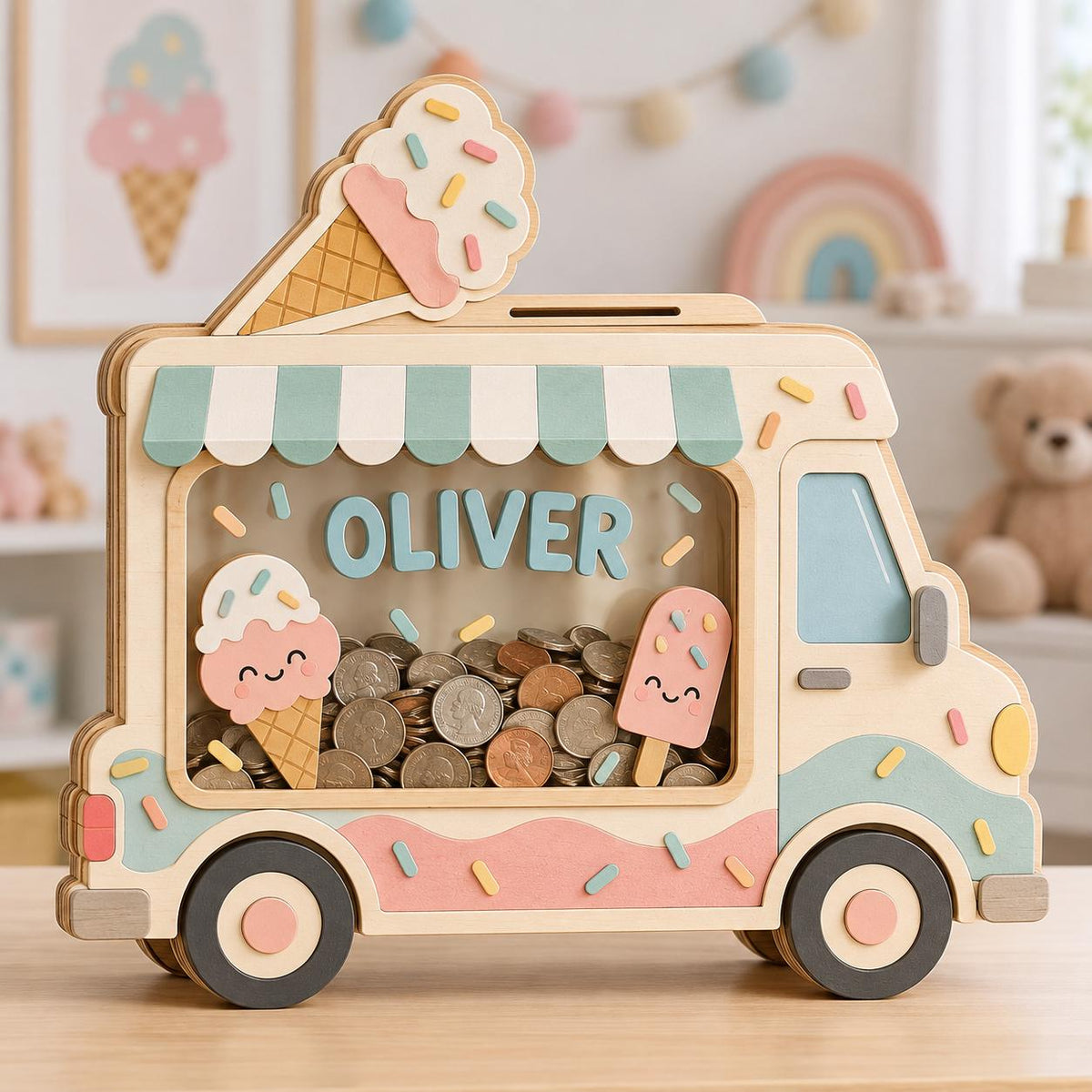 May include: A wooden ice cream truck piggy bank featuring a clear window filled with coins. The truck is decorated with pastel colors, a striped awning, and the name OLIVER in blue letters. It includes cutouts of ice cream treats and sprinkles.