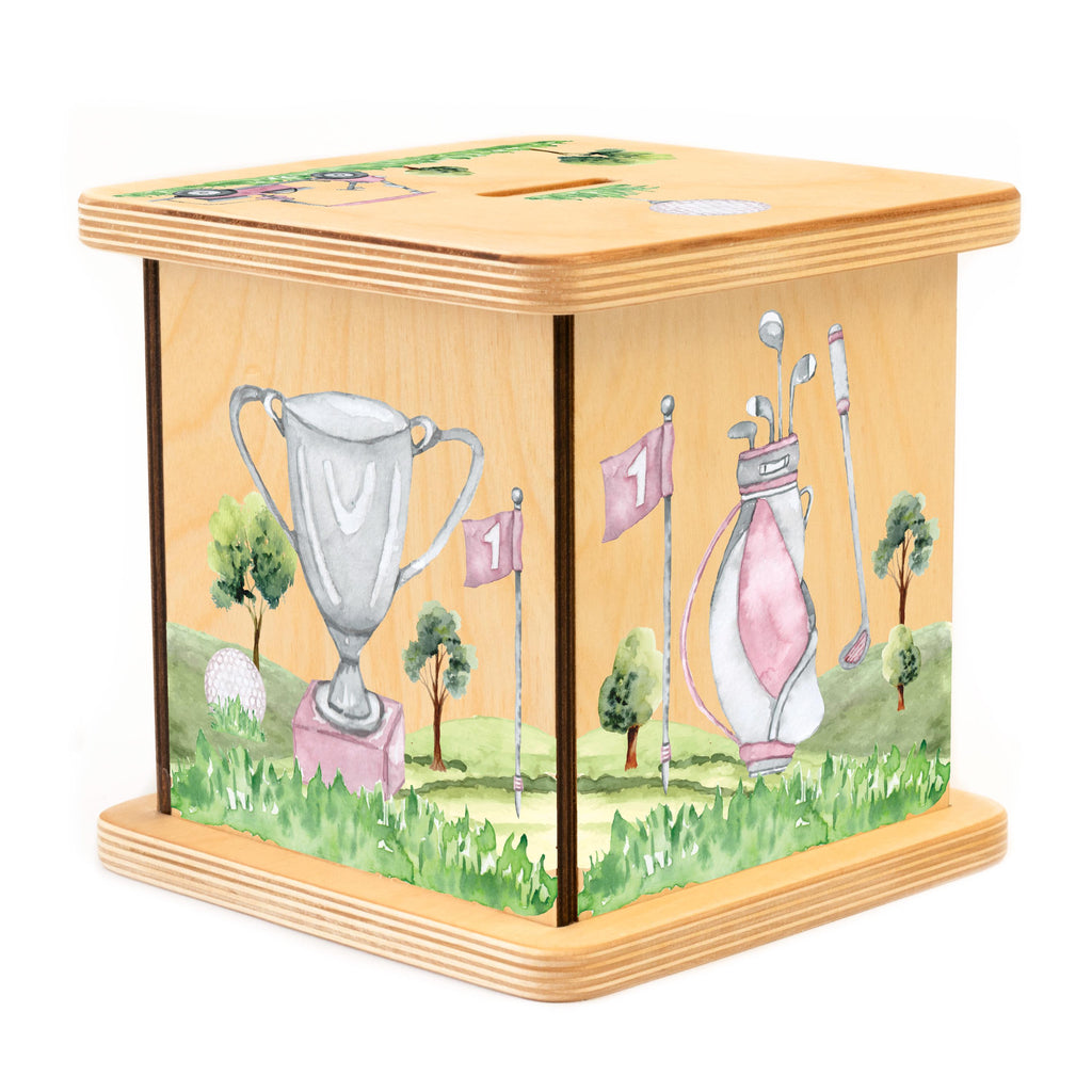 a wooden box with a painting of a trophy and other items