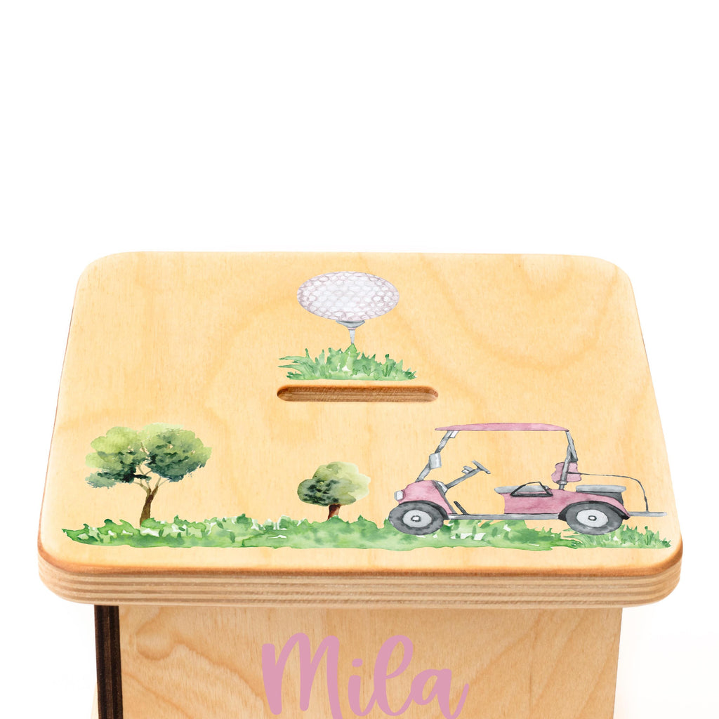 a wooden box with a golf cart painted on it
