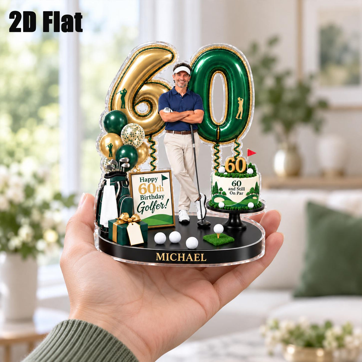 May include: A 2D flat acrylic display featuring a gold number 60 balloon, a green number 60 balloon, a golfer figure, a golf bag, a gift box, and a cake with the text 60 and Still On Par. A sign reads Happy 60th Birthday Golfer! and the base says MICHAEL.