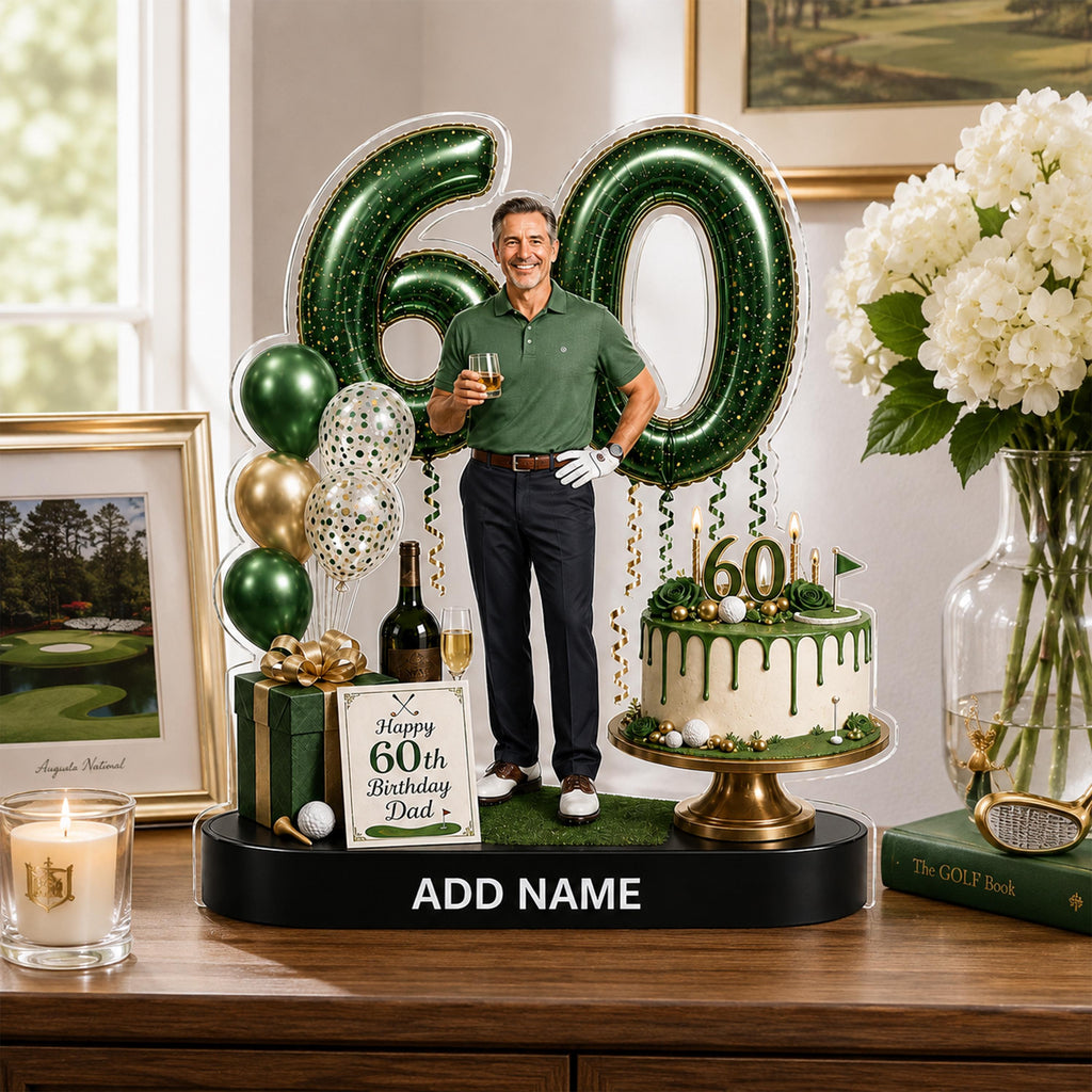May include: A custom 60th birthday cake topper featuring a large green number 60, a cutout of a golfer holding a drink, a green gift box, a sign reading Happy 60th Birthday Dad, and a round cake with green icing drip and golf-themed decorations.