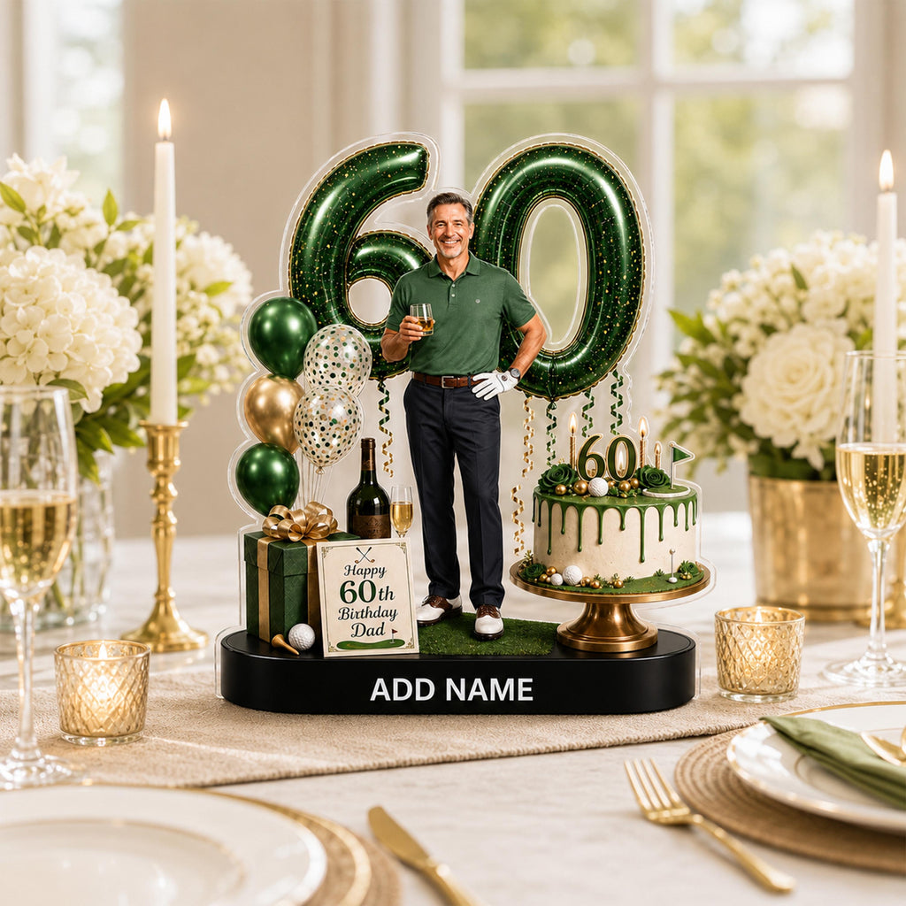 May include: A custom acrylic 60th birthday centerpiece featuring a large green number 60, a photo of a man in a golf shirt, a miniature cake with a 60 topper, gift boxes, and balloons. The black base includes the text ADD NAME and a sign reading Happy 60th Birthday Dad.
