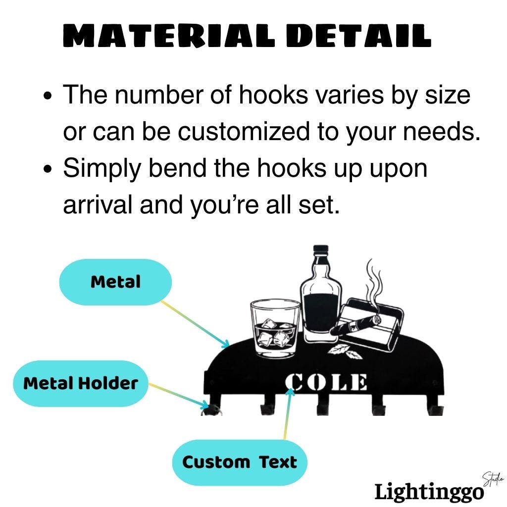 May include: Black metal holder with hooks, featuring a whiskey glass, bottle, and cigar. The word "COLE" is displayed. The text "MATERIAL DETAIL" and instructions are also present.