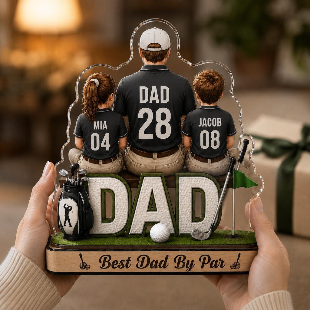 May include: A personalized golf-themed acrylic display featuring the word "DAD" in large, white letters. The design includes a father and two children, with the text "Best Dad By Par" at the base, and golf accessories.
