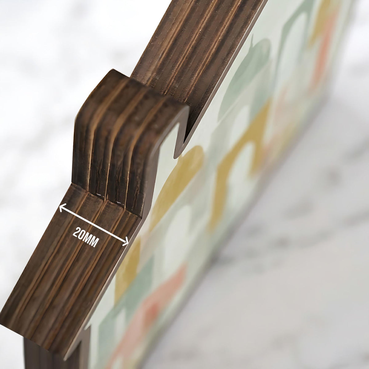 May include: A house-shaped wooden object with a dark brown stained edge and a light-colored front panel featuring abstract shapes in yellow, green, and orange. The side profile shows a thickness of 20mm, highlighting the layered plywood construction.