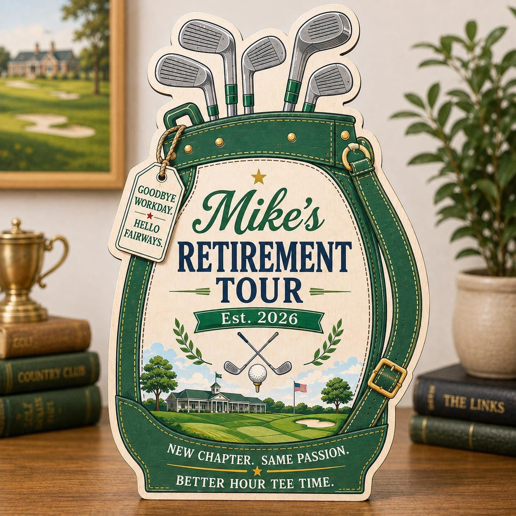 May include: A wooden golf bag sign featuring the text Mike's RETIREMENT TOUR Est. 2026. The design includes golf clubs, a clubhouse, a golf ball, and a tag reading GOODBYE WORKDAY. HELLO FAIRWAYS. The base text reads NEW CHAPTER. SAME PASSION. BETTER HOUR TEE TIME.