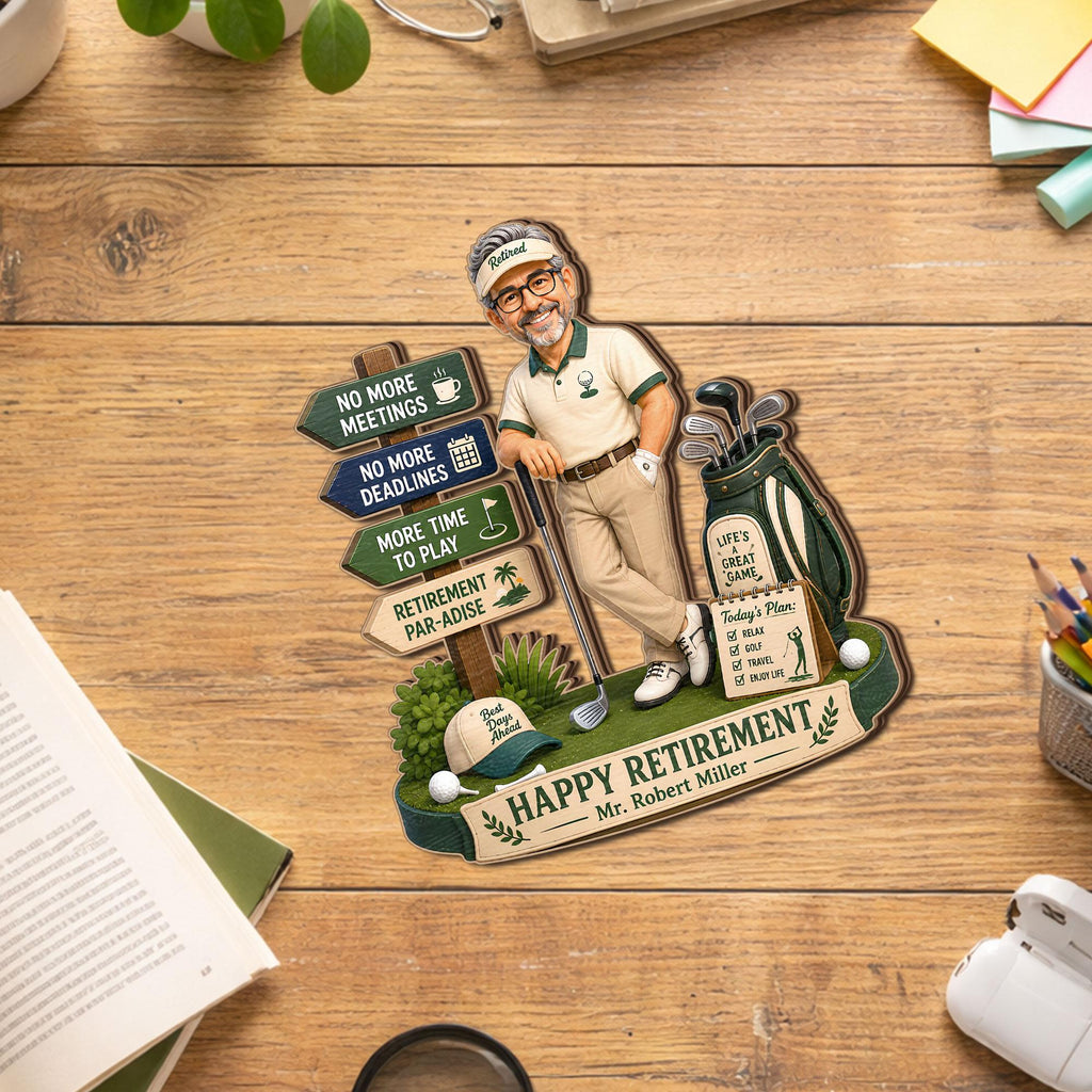 May include: A decorative wooden cutout featuring a cartoon golfer leaning on a club. Signposts read: NO MORE MEETINGS, NO MORE DEADLINES, MORE TIME TO PLAY, RETIREMENT PAR-ADISE. A golf bag, a cap, and a sign reading HAPPY RETIREMENT Mr. Robert Miller are included.