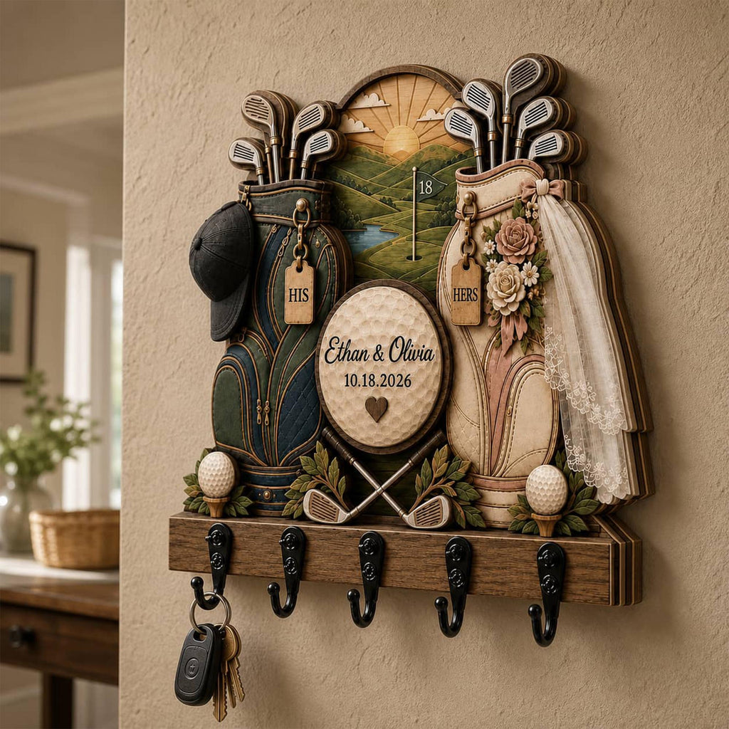 May include: A wooden wall-mounted key holder featuring two golf bags, one labeled 'HIS' and one 'HERS', with a central golf ball plaque inscribed 'Ethan & Olivia 10.18.2026'. The design includes golf clubs, a veil, and five black metal hooks.