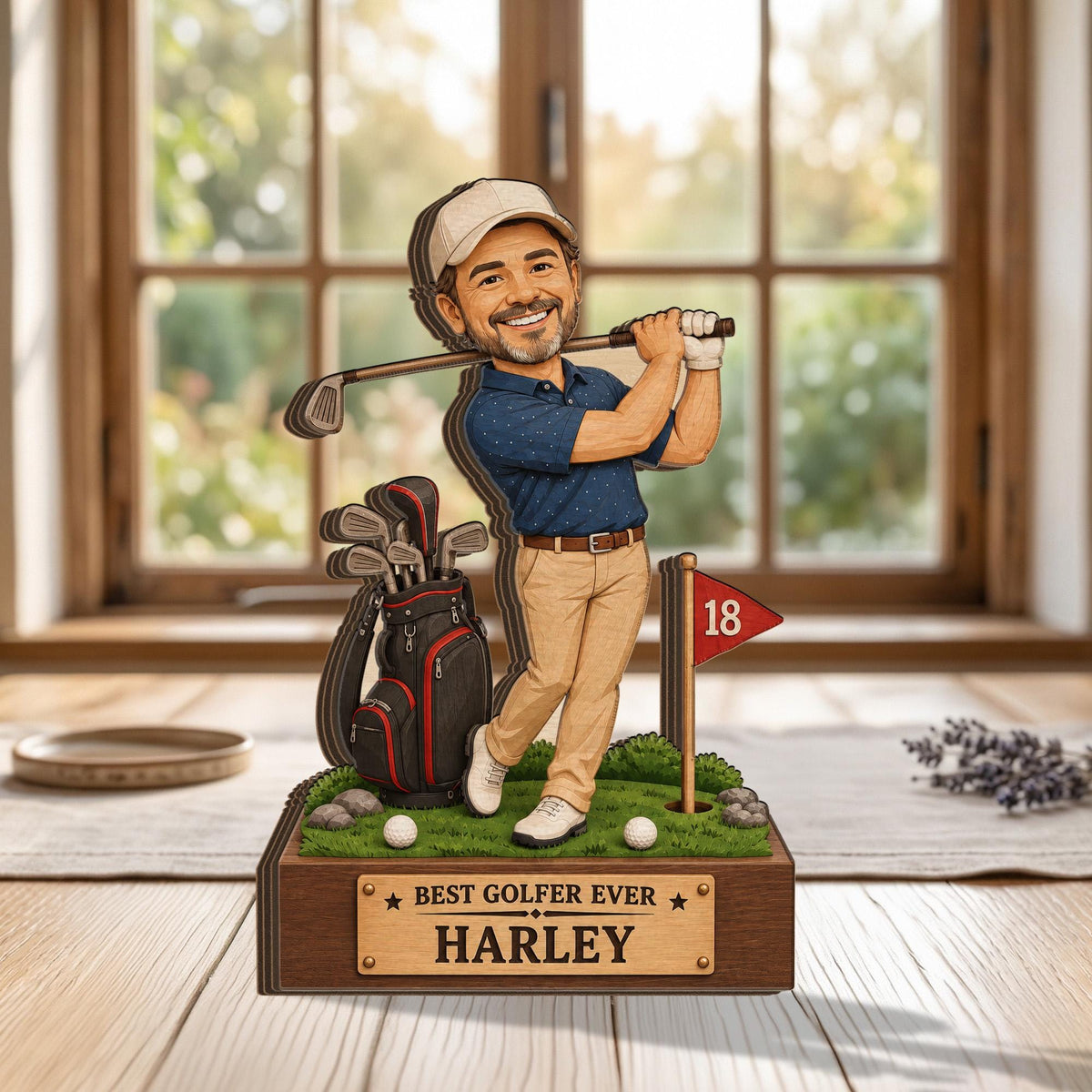 May include: A custom wooden figurine of a golfer wearing a white cap, blue polo shirt, and tan trousers, holding a golf club. Beside the figure is a black golf bag, a red flag with the number 18, and two golf balls. The base features the text BEST GOLFER EVER HARLEY.