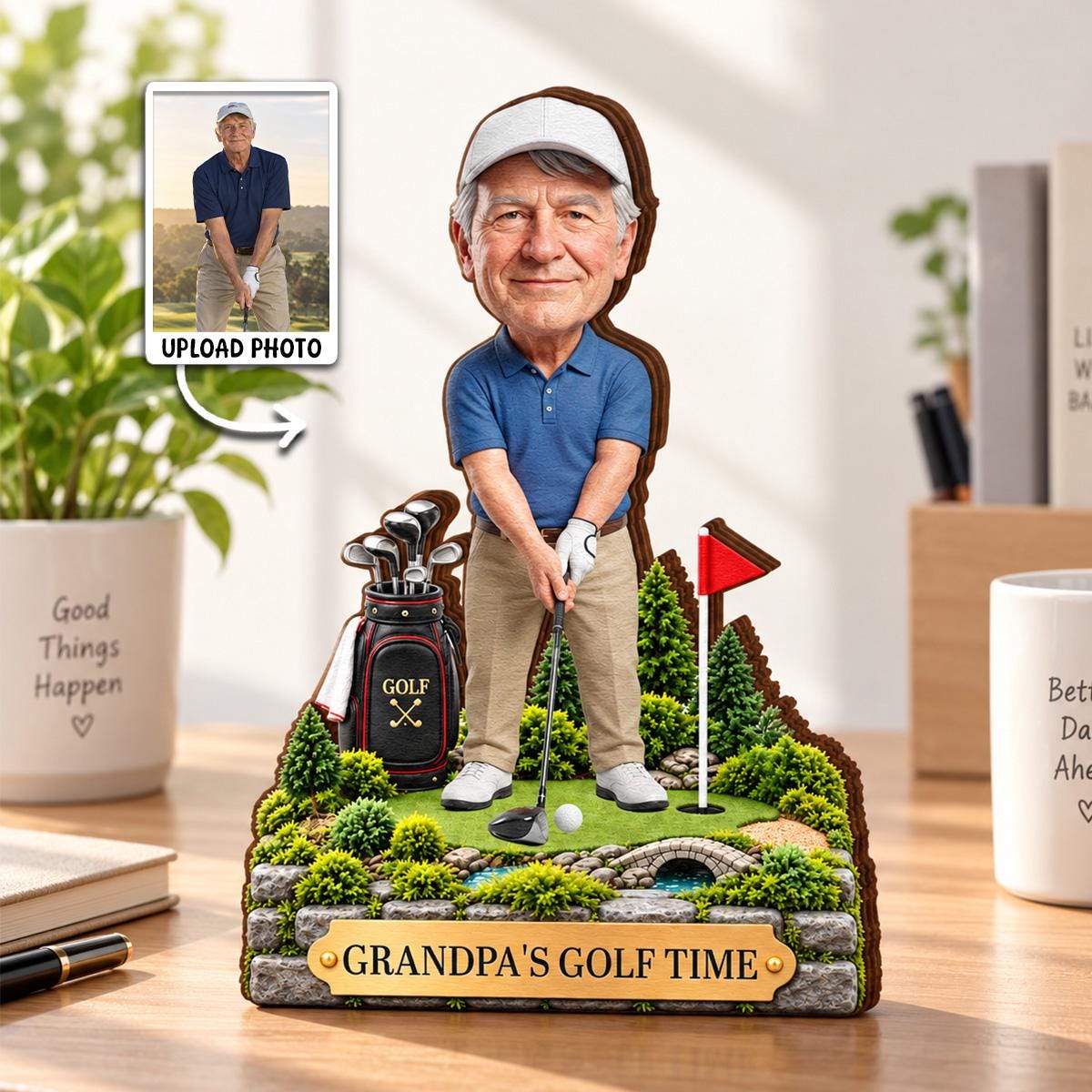 May include: A custom bobblehead figure of a golfer wearing a blue polo shirt and khaki pants, standing on a miniature golf course base with a golf bag, flag, and stone bridge. A plaque at the front reads "GRANDPA'S GOLF TIME" in gold lettering.